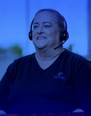 Smiling customer service individual.